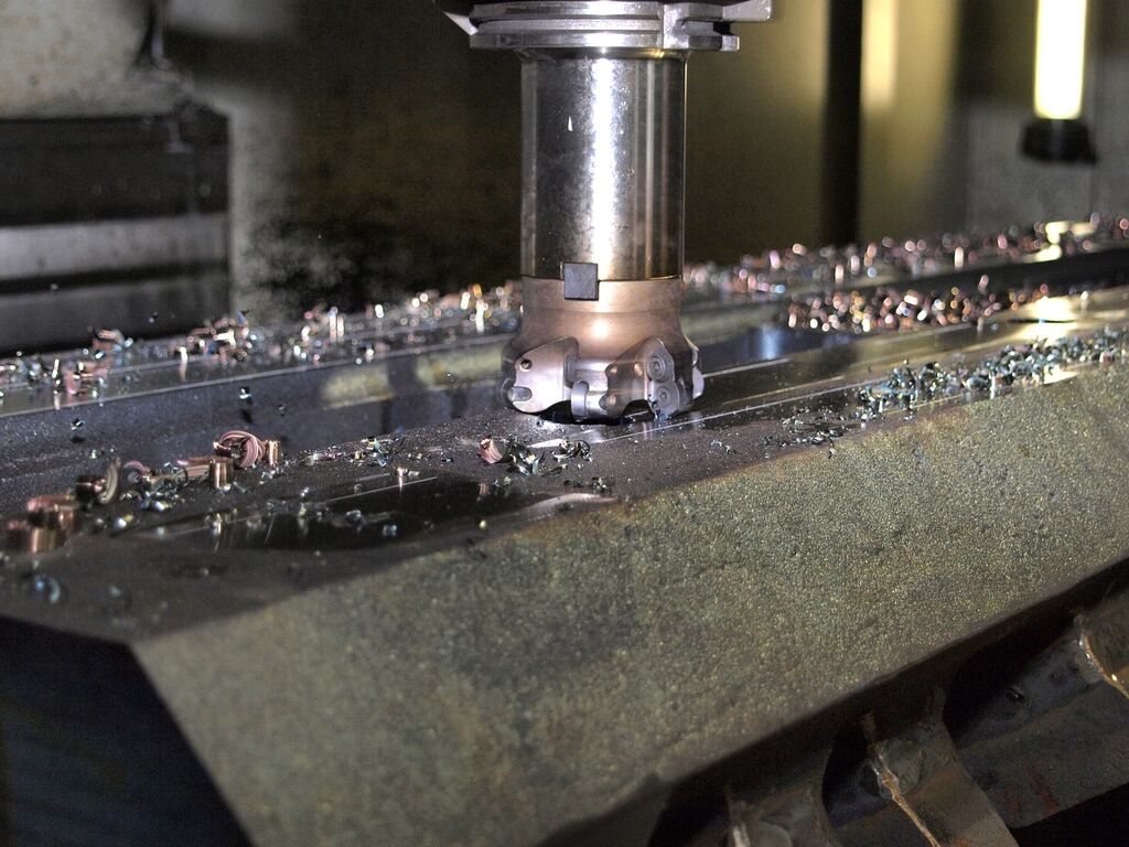 Face mill cutting an aluminium plate